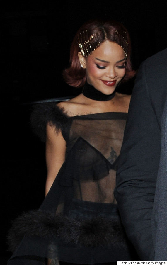 Rihanna Sheds Her Cloak For Sheer Top At Met Gala After-Party Rihanna Sheds Her Cloak For Sheer Top At Met Gala After-Party